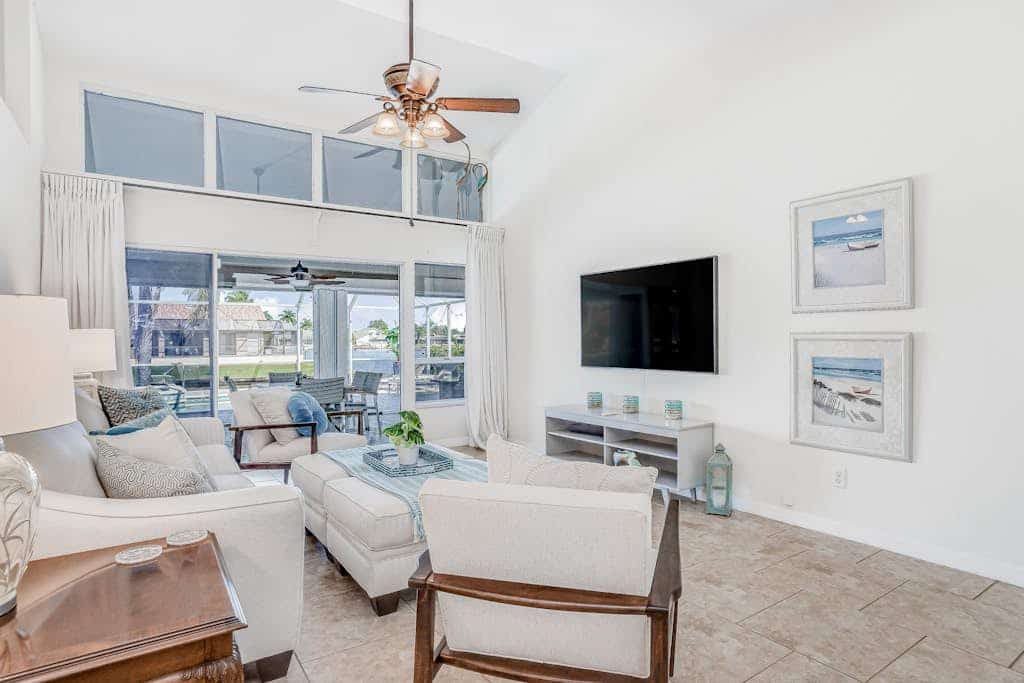 Stunning waterfront snowbird escape with private saltwater pool, dock, AC & W/D