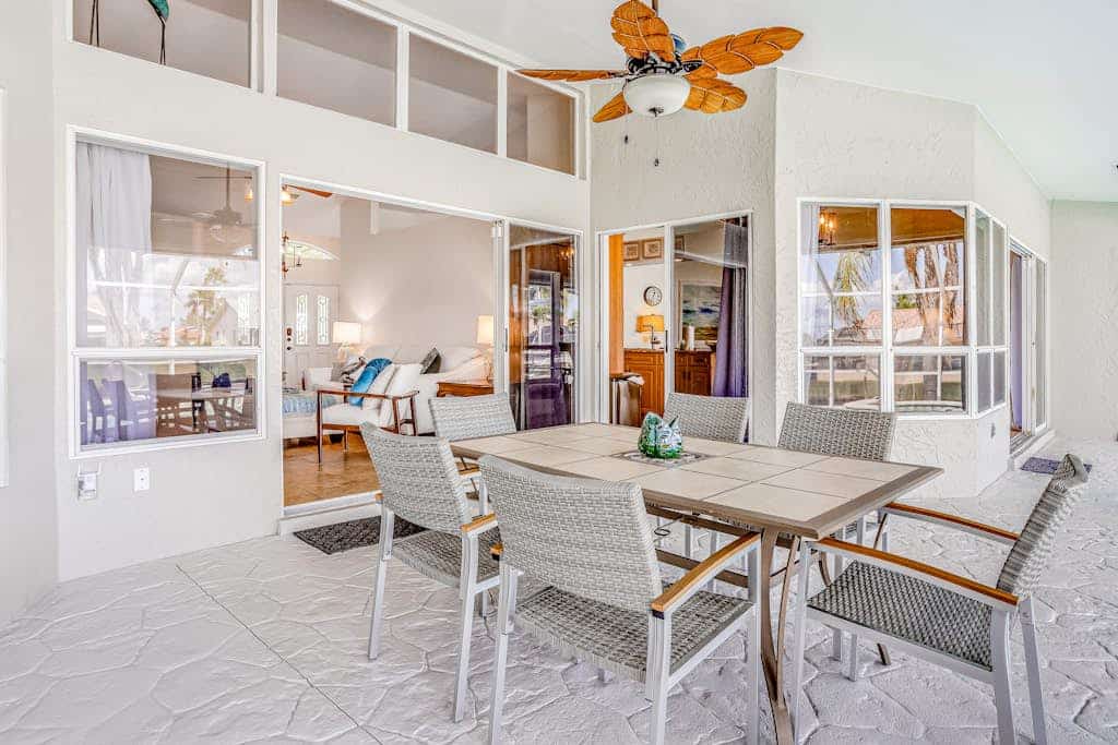 Stunning waterfront snowbird escape with private saltwater pool, dock, AC & W/D