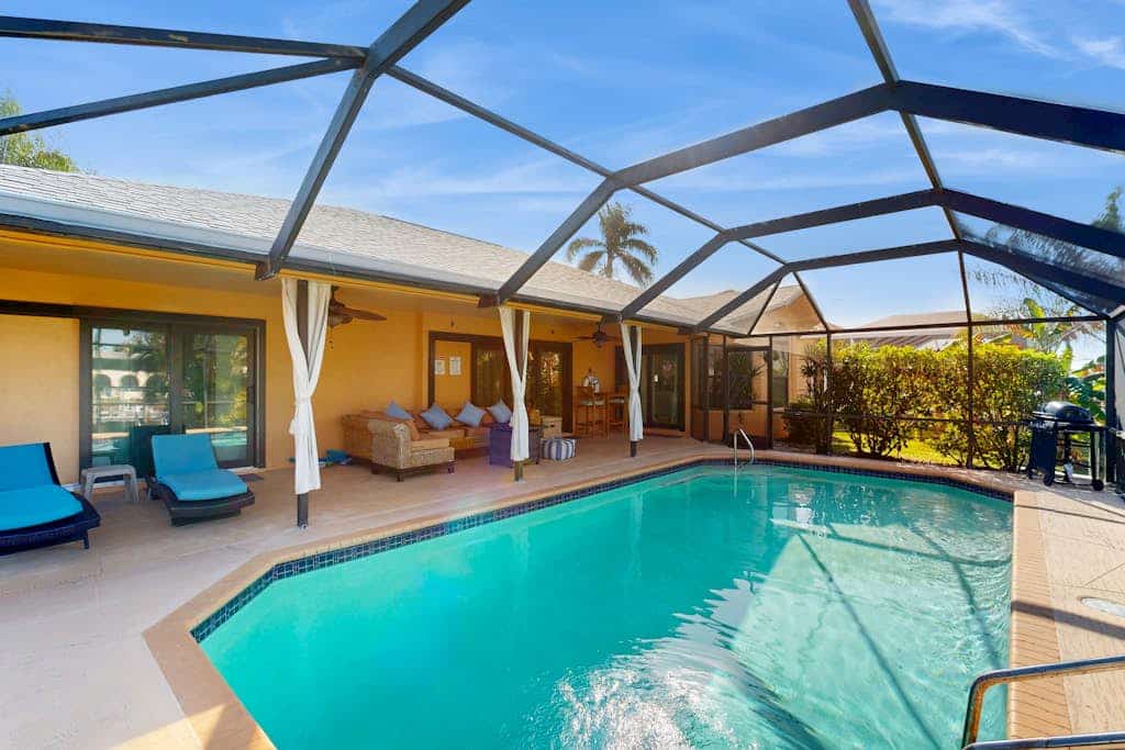Canalfront Home with WiFi, Private Pool, & Dock w/ Gulf + River Access - Dogs OK