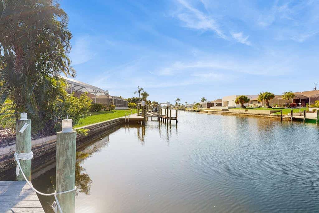 Canalfront Home with WiFi, Private Pool, & Dock w/ Gulf + River Access - Dogs OK