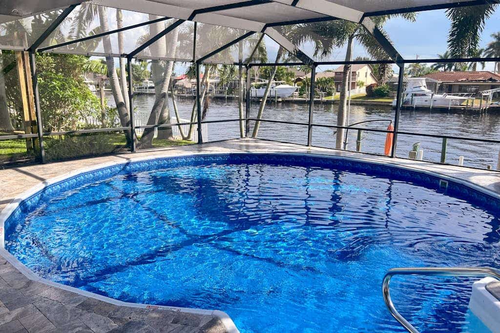 Waterfront home with pool, family & dog friendly, close to river & Gulf beaches