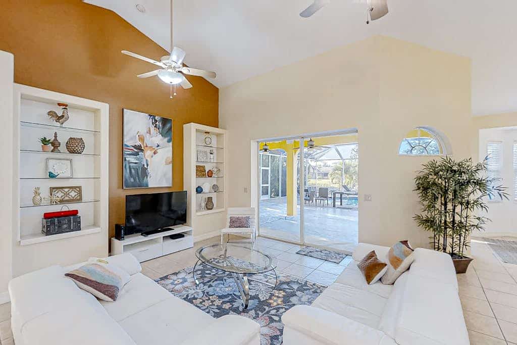 Canal-front home with pool, outdoor kitchen, & private dock - dog-friendly