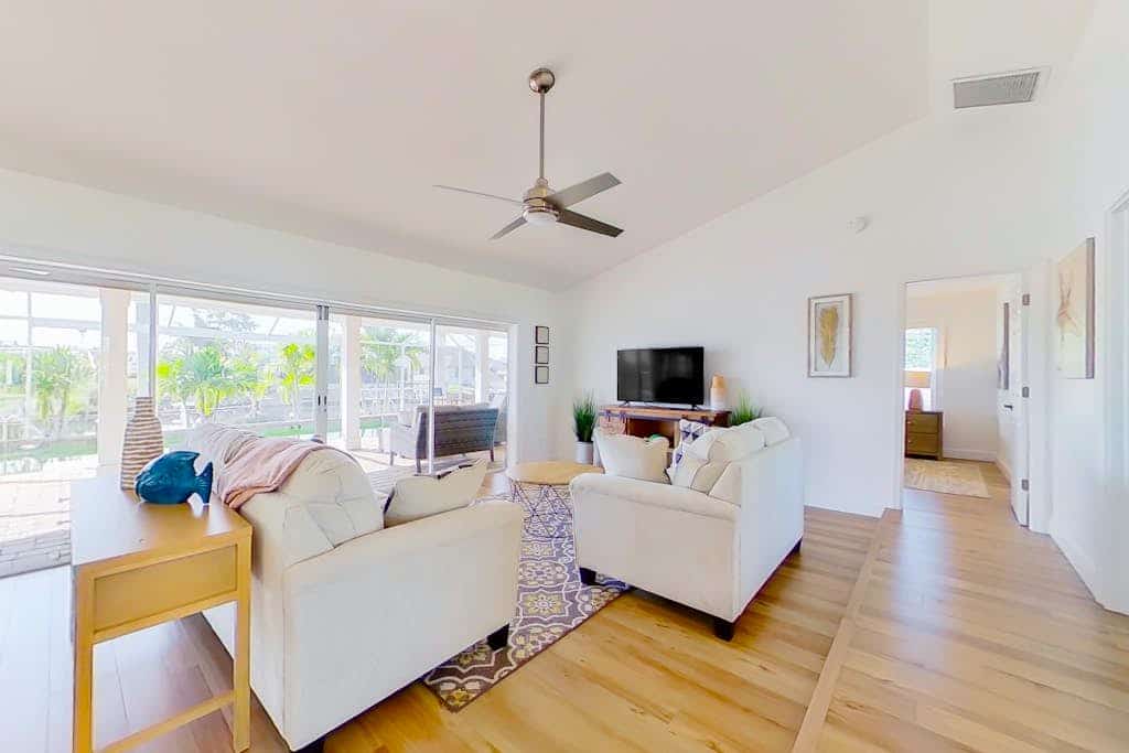 Fully updated, canal-front home with pool, W/D, and central AC - great location
