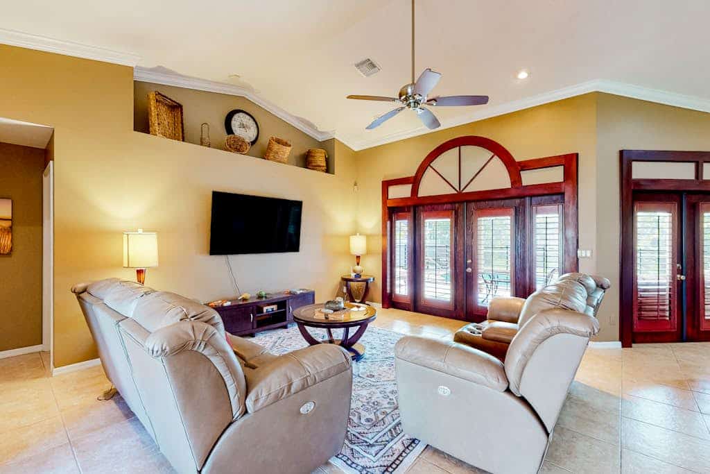 Inviting home with pool, water view, enclosed yard, central AC, W/D