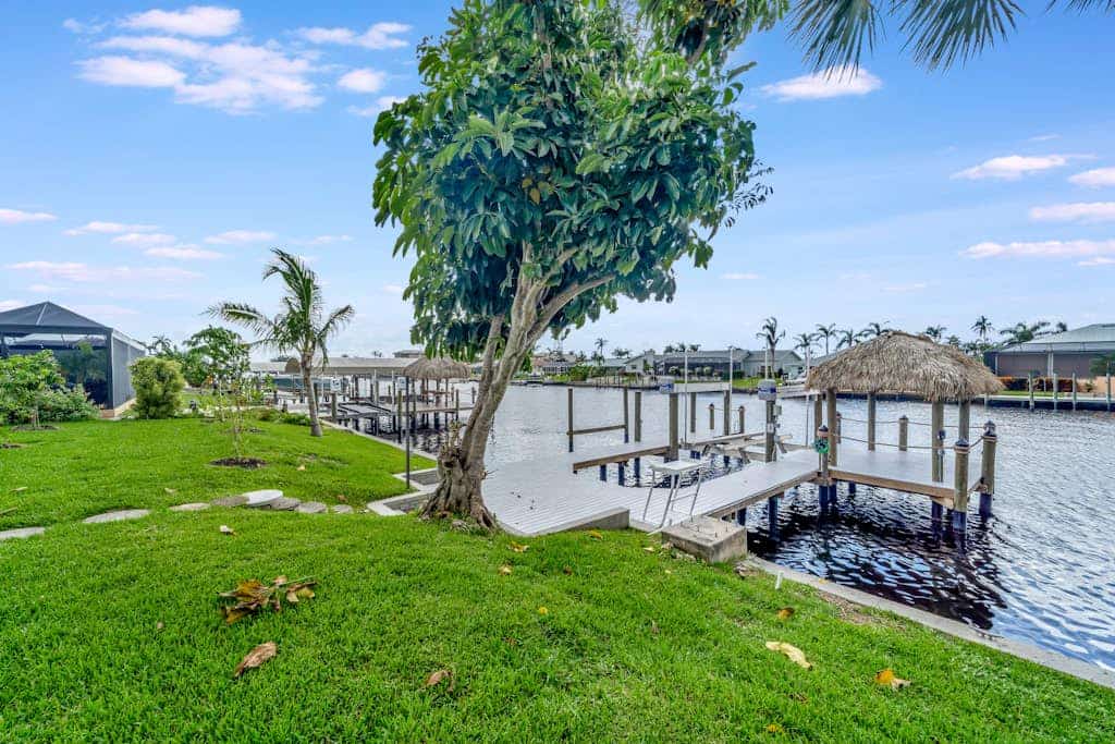 Dog-friendly water-view house with pool & firepit - snowbirds welcome