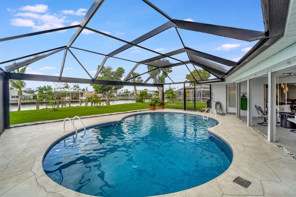 Dog-friendly water-view house with pool & firepit - snowbirds welcome
