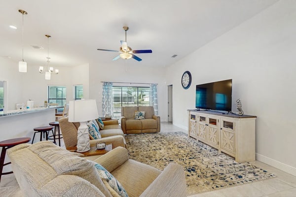 Spacious Canal-Front home with private heated pool, lanai, Game Room