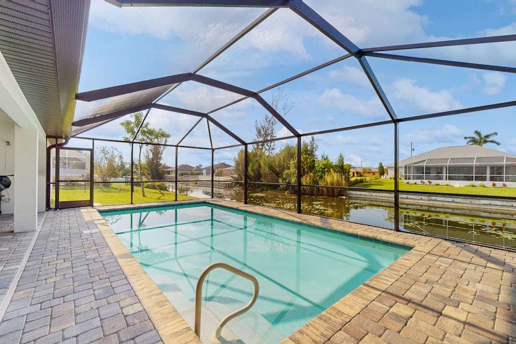 Spacious Canal-Front home with private heated pool, lanai, Game Room
