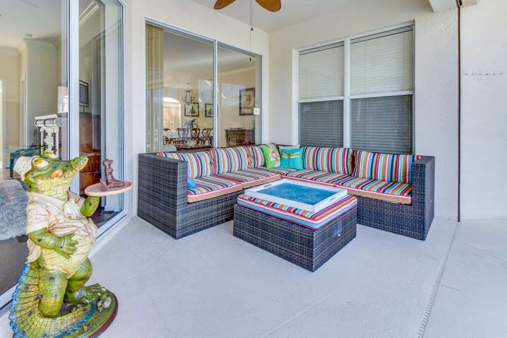 Spacious home with screened-in pool & lush lakefront views - minutes to beaches