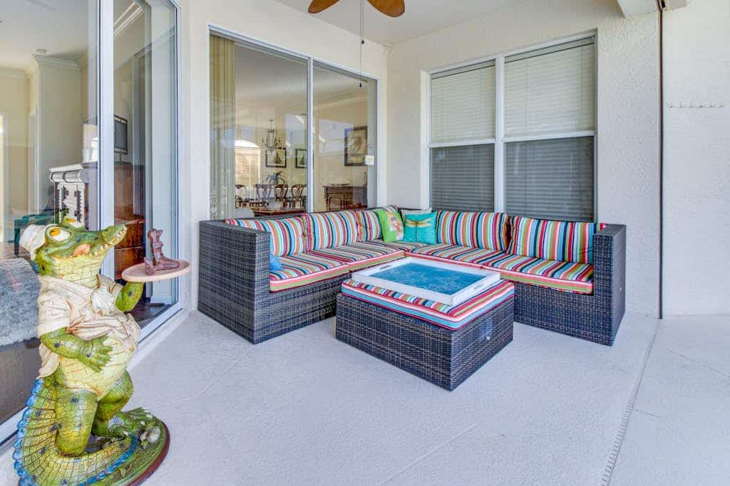 Spacious home with screened-in pool & lush lakefront views - minutes to beaches
