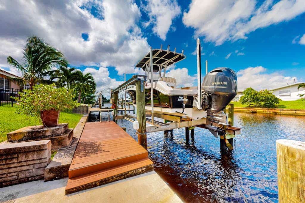 Inviting dog-friendly home with pool, water view, central AC, & W/D