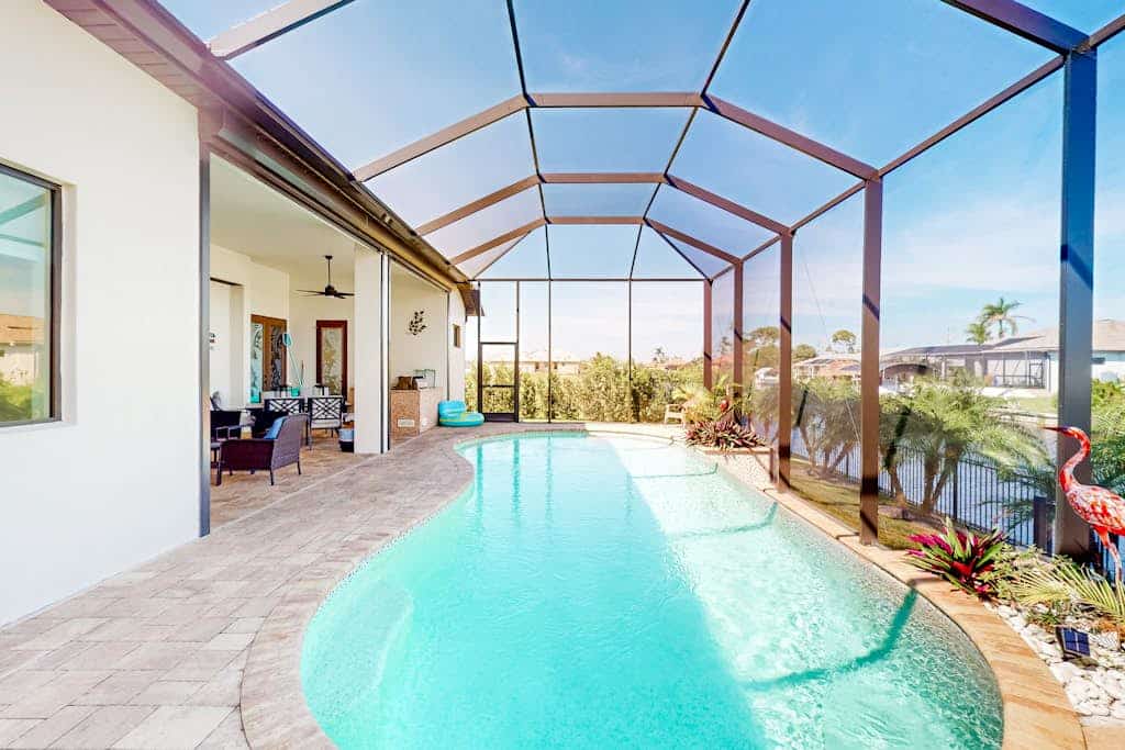 Amazing dog-friendly riverfront oasis w/ private pool, patio, dock & EV charger