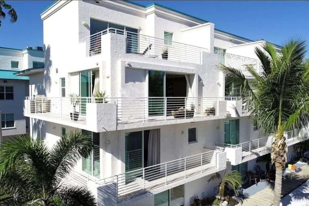 Luxe waterfront townhome with water views, 4 decks, & all-new interior