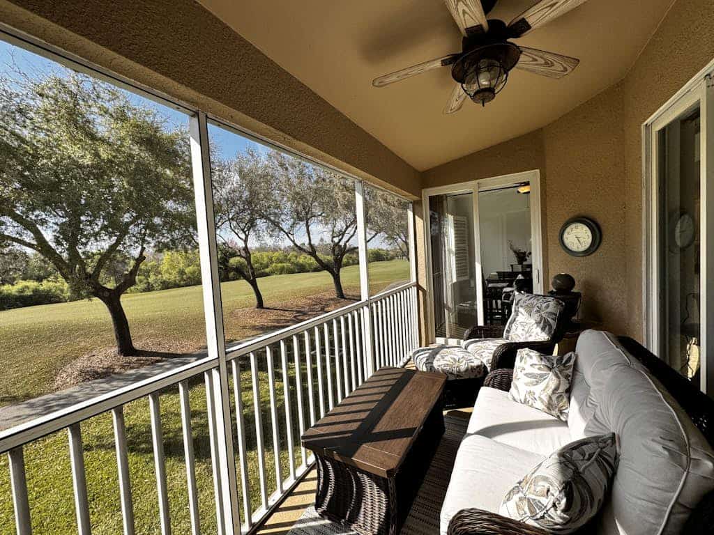 Resort community home with bikes, screened porch, on-site golf, & AC