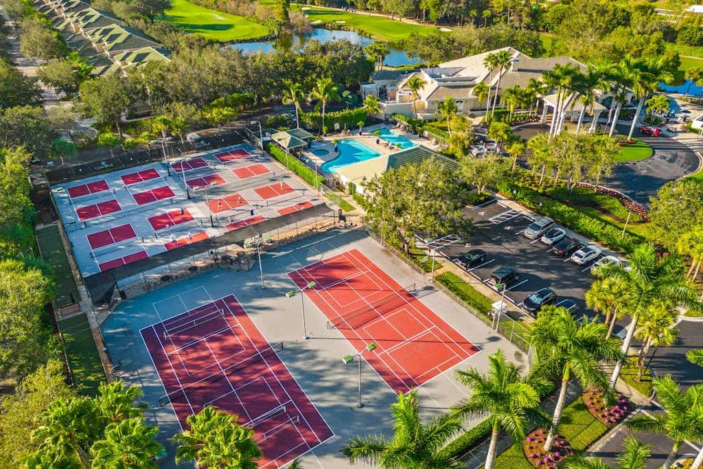 Resort community home with bikes, screened porch, on-site golf, & AC