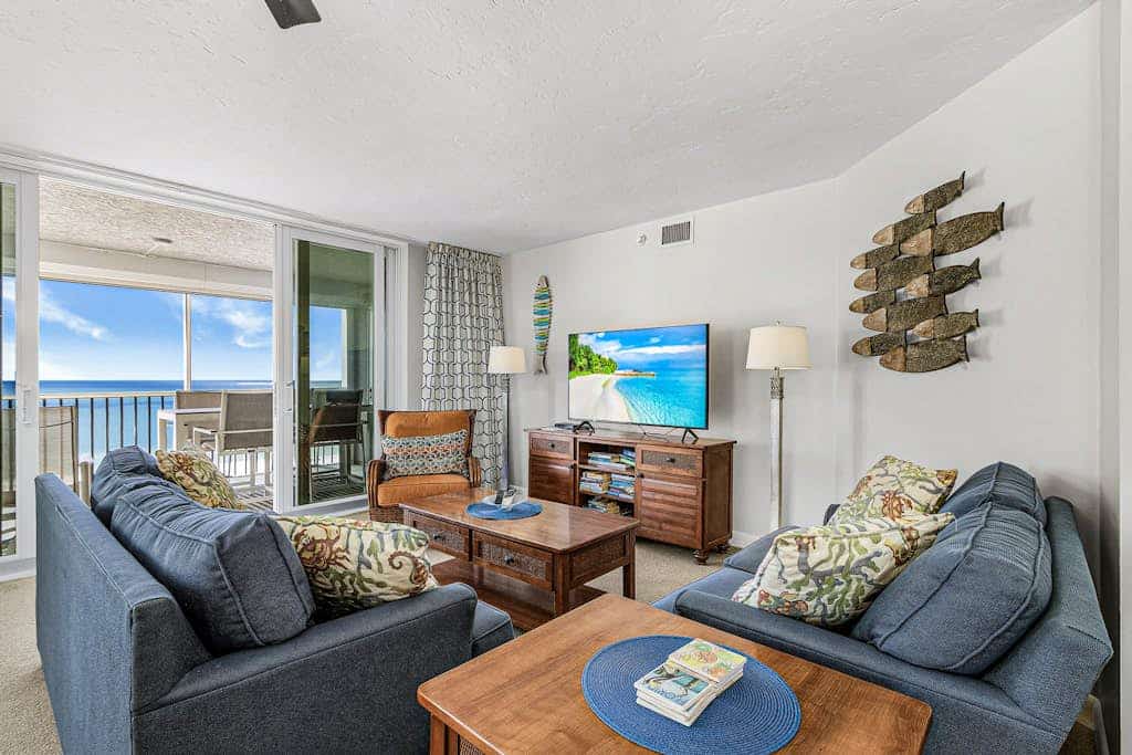 Waterfront penthouse with beach views, pool, hot tub, & tennis court