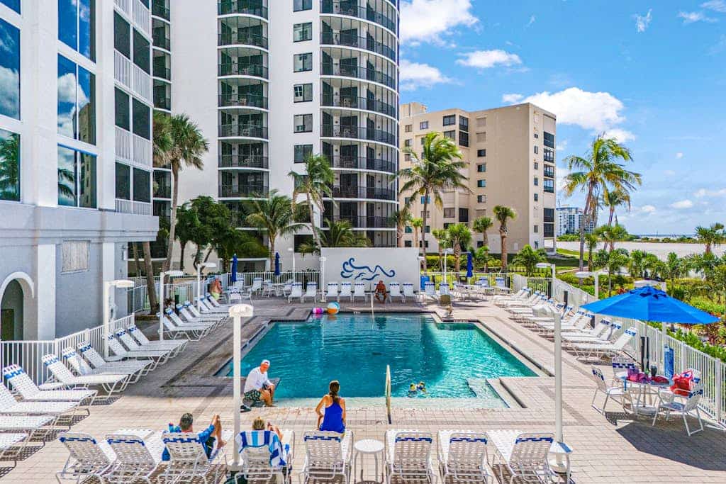Waterfront penthouse with beach views, pool, hot tub, & tennis court