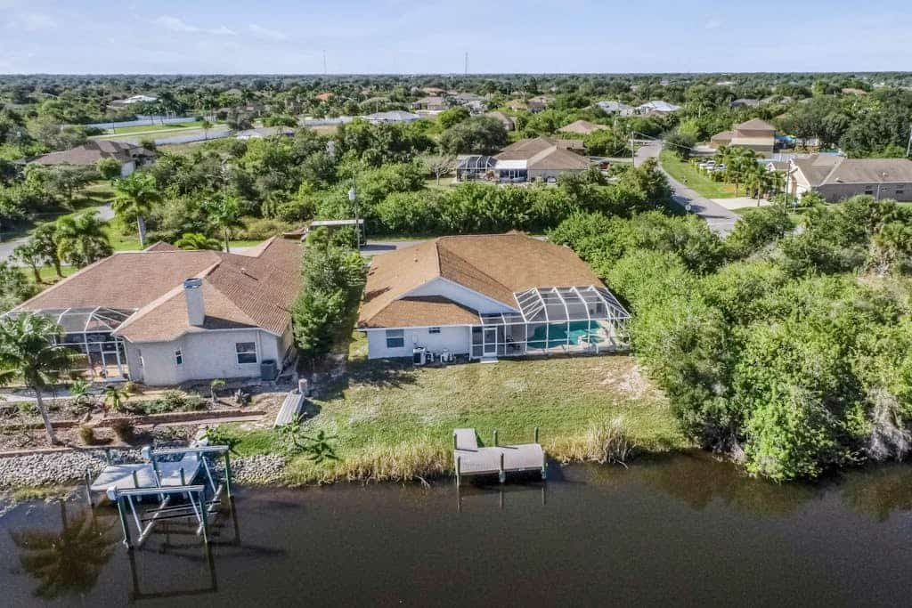 Dog-friendly home with private heated pool, grill, A/C, & washer/dryer