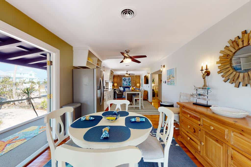 Tropical Palm Island home steps from the beach with grill, outdoor shower, dock