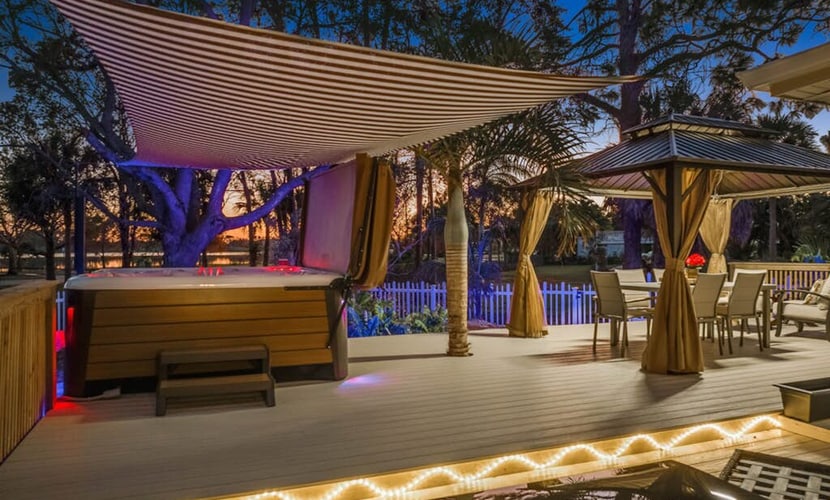 Dog-friendly lakefront home with hot tub, gazebo, firepit, outdoor kitchen, W/D