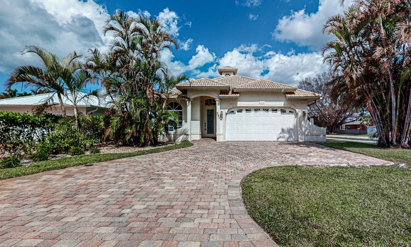 Centrally located home with a private pool and walking distance to beach