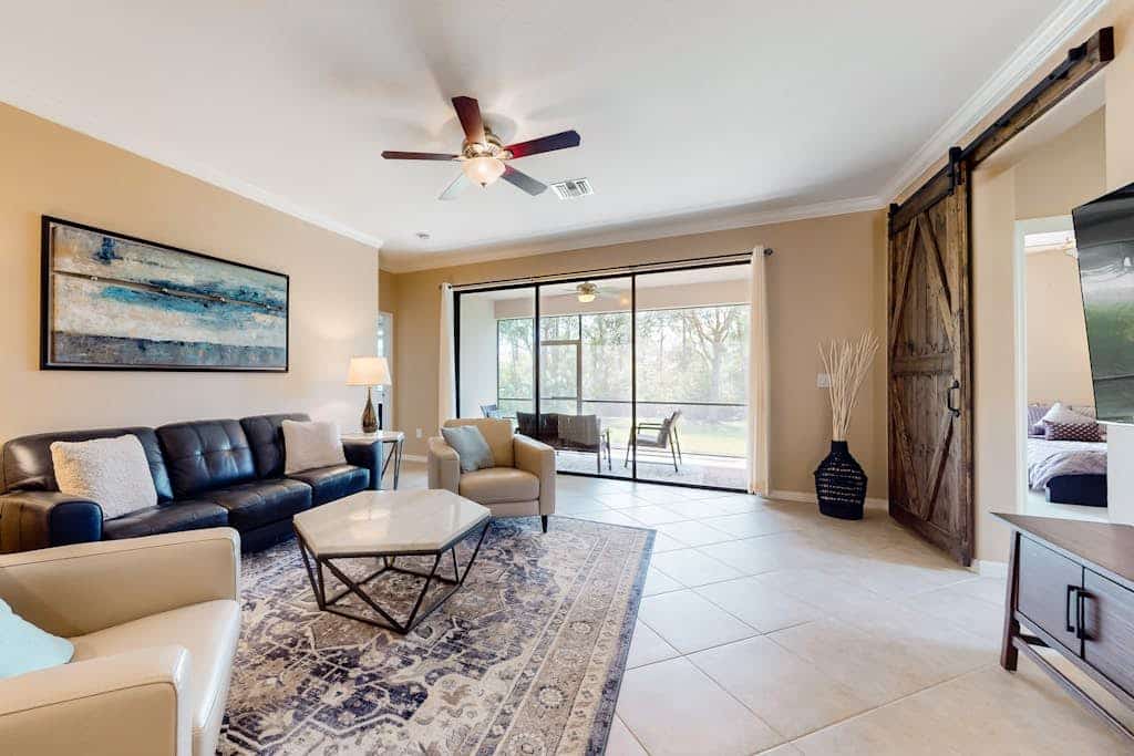 Spacious home with enclosed lanai, WiFi, AC, WD, pool, tennis court, & gym
