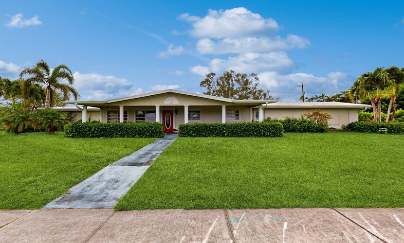 Luxurious single-level retreat w/ indoor pool, game room, and modern comforts