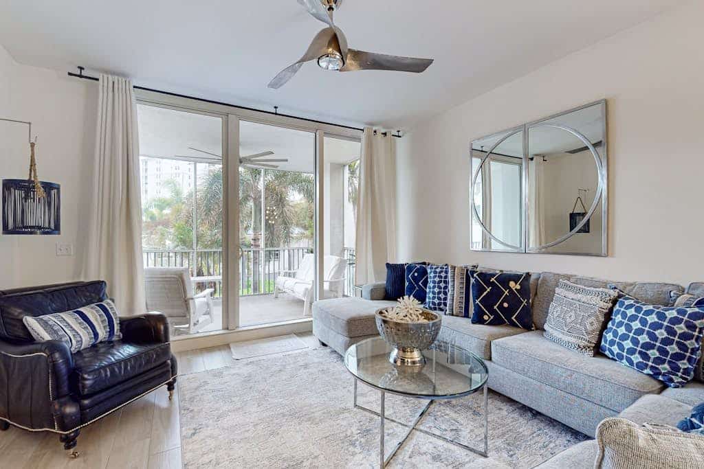 Luxurious condo with on-site pool, private extended balcony, & W/D