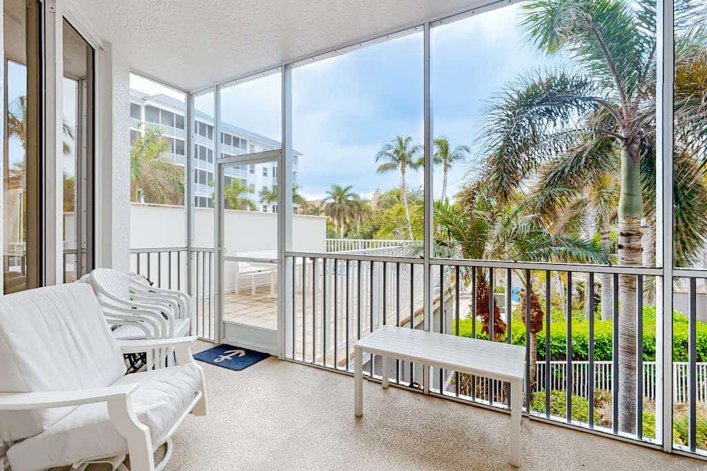 Luxurious condo with on-site pool, private extended balcony, & W/D