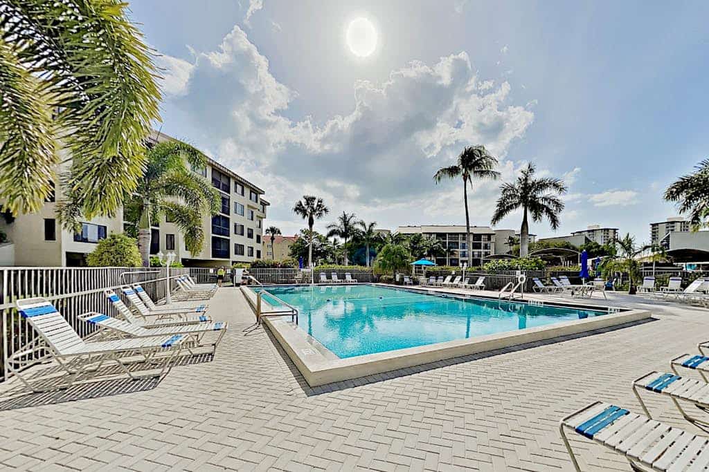 Corner Unit Condo with Private Balcony, and Shared Pool - Walk to Beach