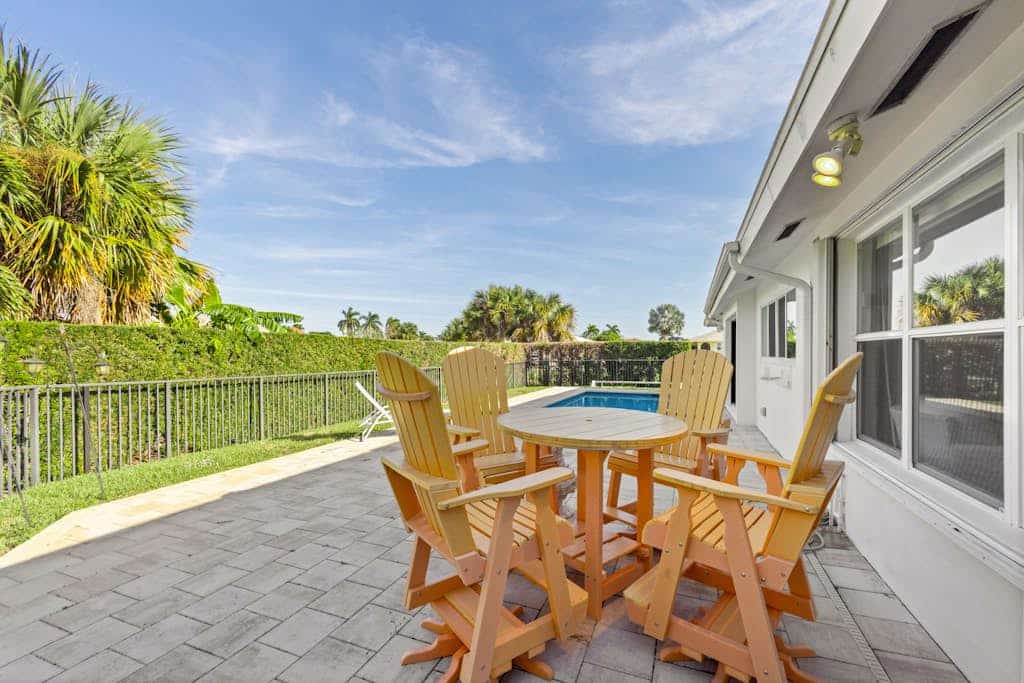 Snowbird-friendly home near water with private heated pool, grill, patio, & W/D