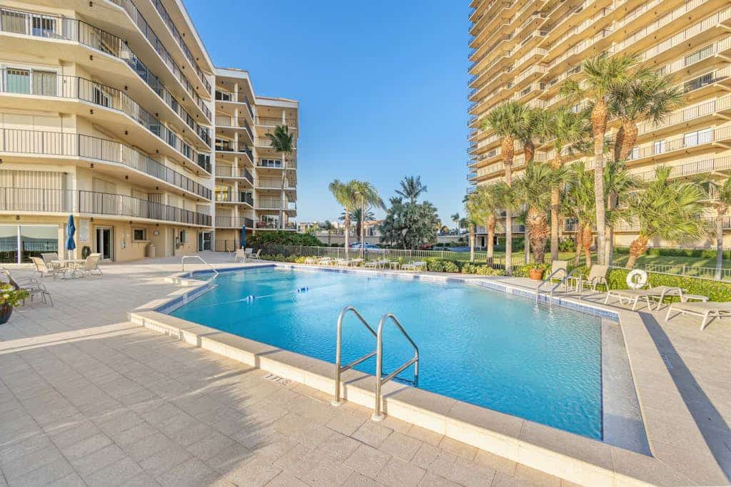 Spacious oceanfront condo with heated pool, pickleball, tennis, gym, & balcony