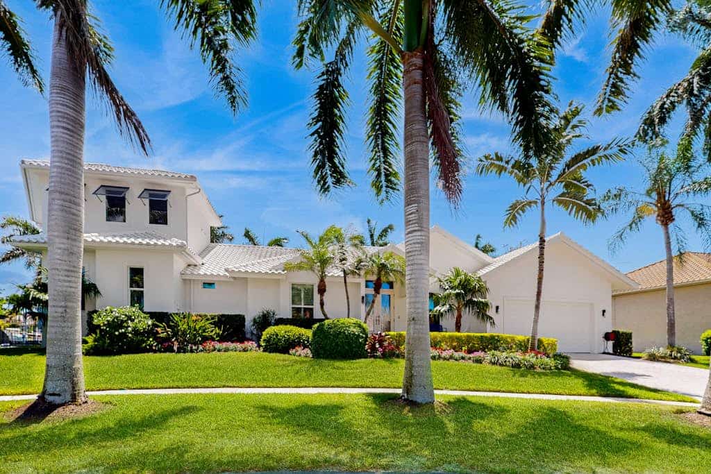 Dog-friendly waterfront getaway with lanai, private pool, & pool spa