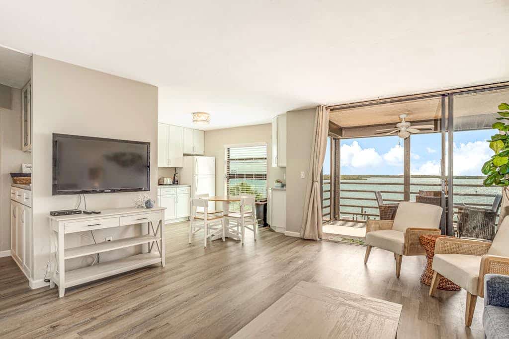 Bayfront condo with shared pool, dock, & water views - snowbird-friendly