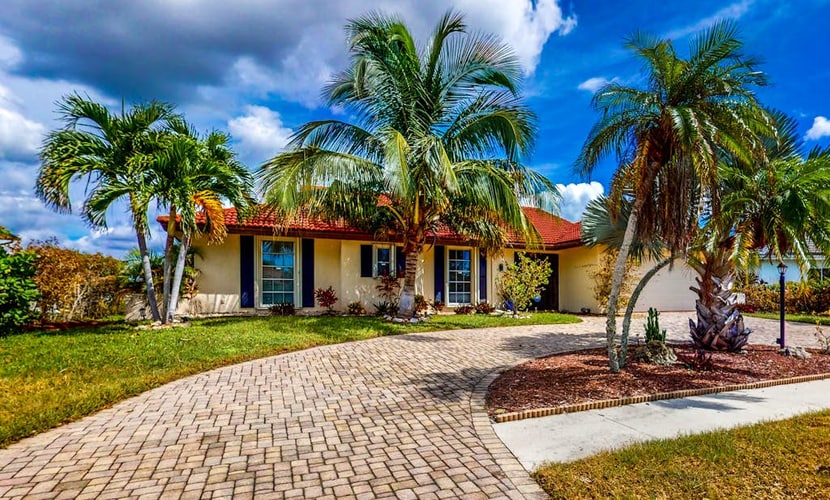 Waterfront Home with Private Dock & Enclosed Lanai - Near Residence Beach