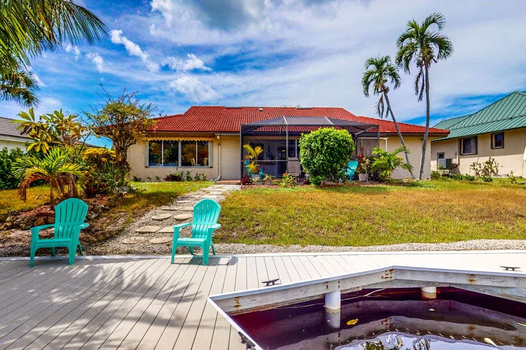 Waterfront Home with Private Dock & Enclosed Lanai - Near Residence Beach