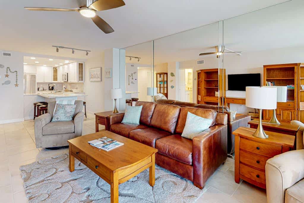Waterfront condo with bay views, pool, tennis, pickleball, beach, & dock access