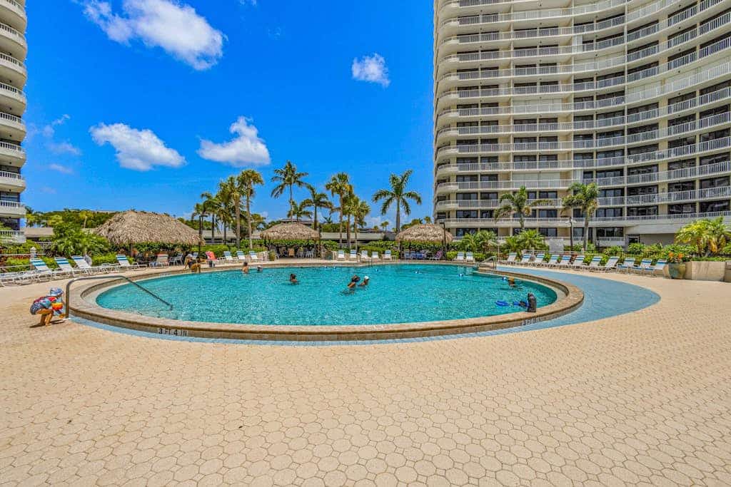 Gulf-front getaway with on-site pool, tennis, putting green, dock, & gym