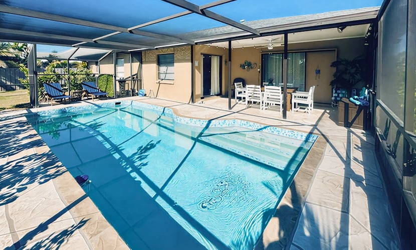 Luxurious pool home close to the beach, family friendly with AC and WIFI