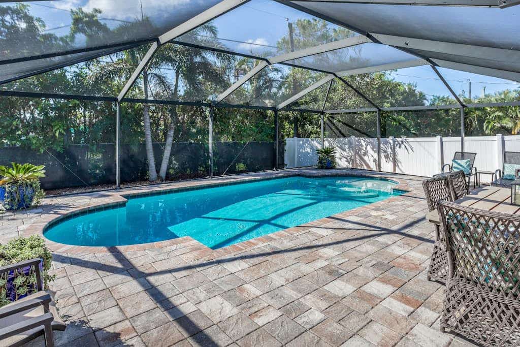 Inviting home with saltwater pool, outdoor dining area, and internet