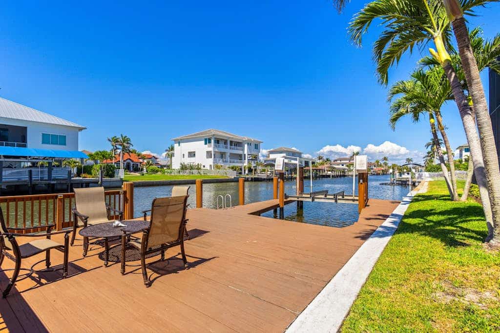 Exquisite waterfront home with lanai, heated pool and spa(hot tub), and internet