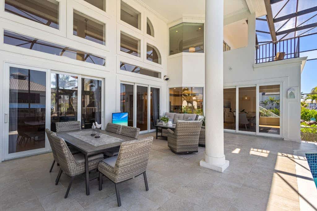 Exquisite waterfront home with lanai, heated pool and spa(hot tub), and internet