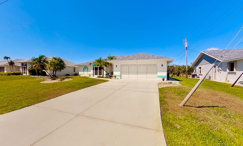 Bohemian canal-front retreat with pool, beach gear, adult bikes, & AC - dogs ok