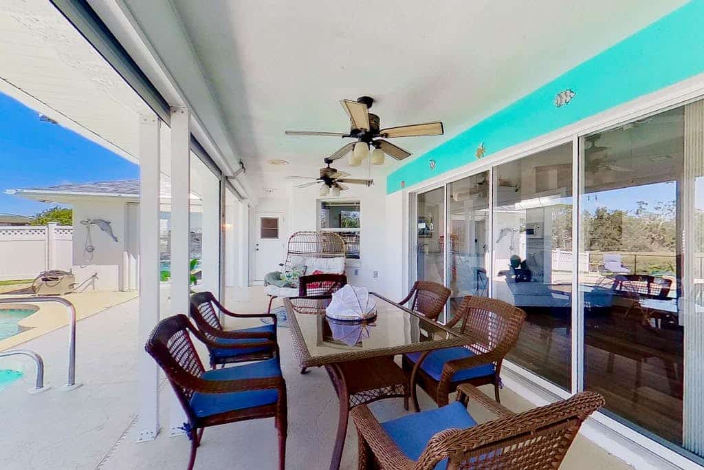 Bohemian canal-front retreat with pool, beach gear, adult bikes, & AC - dogs ok