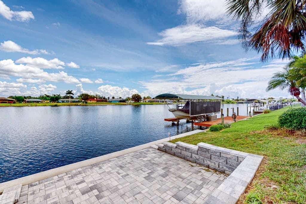 Stylish Waterfront Escape | Sunroom Views, Full Renovation, A/C & Prime Location