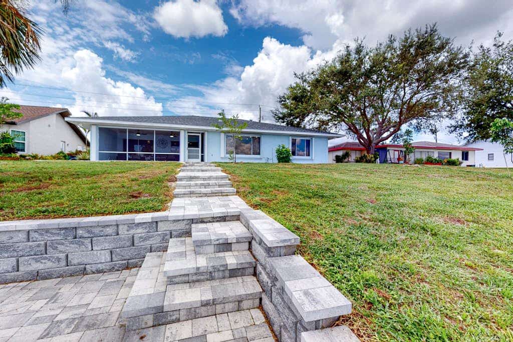 Stylish Waterfront Escape | Sunroom Views, Full Renovation, A/C & Prime Location