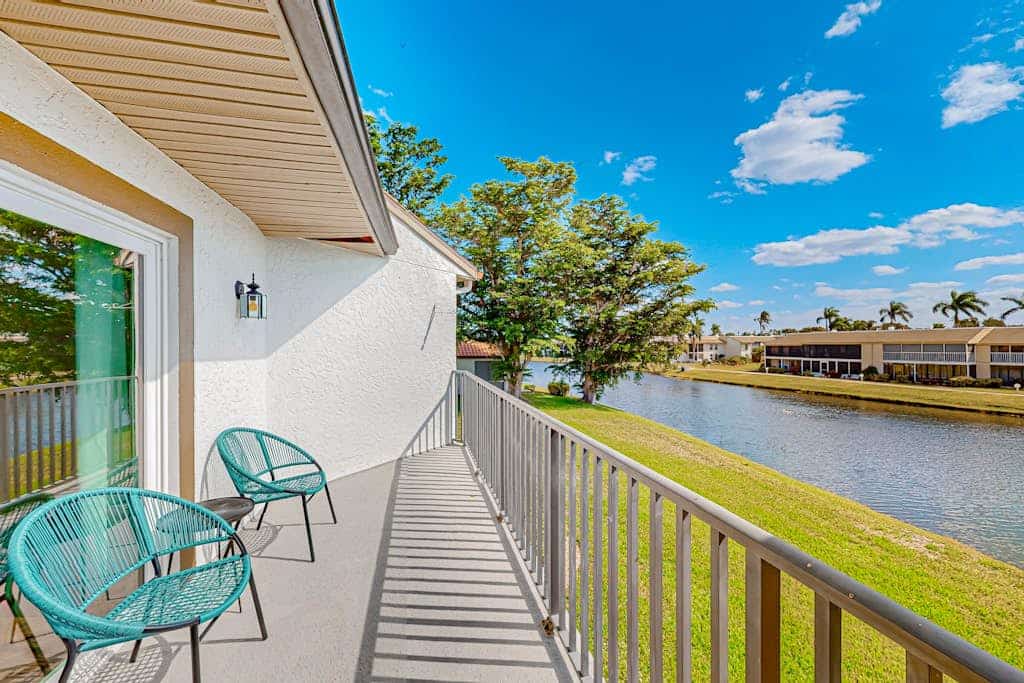 Waterfront condo with balcony, pool, pickball/tennis, & walking paths