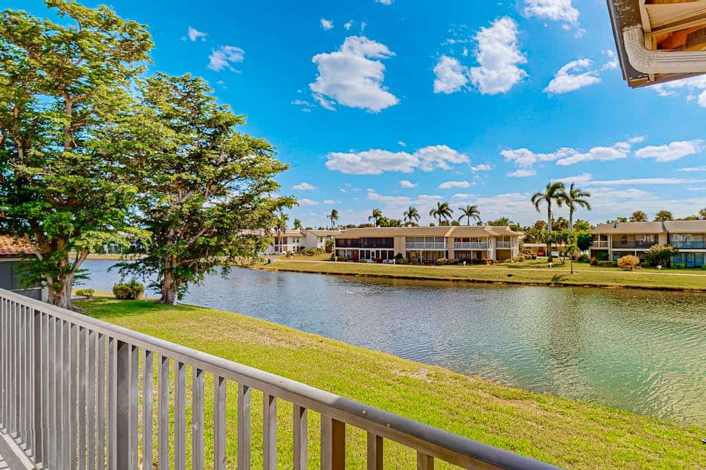 Waterfront condo with balcony, pool, pickball/tennis, & walking paths