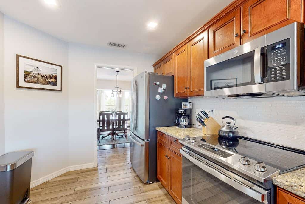 Renovated dog-friendly home near beach with private pool, screened lanai, grill