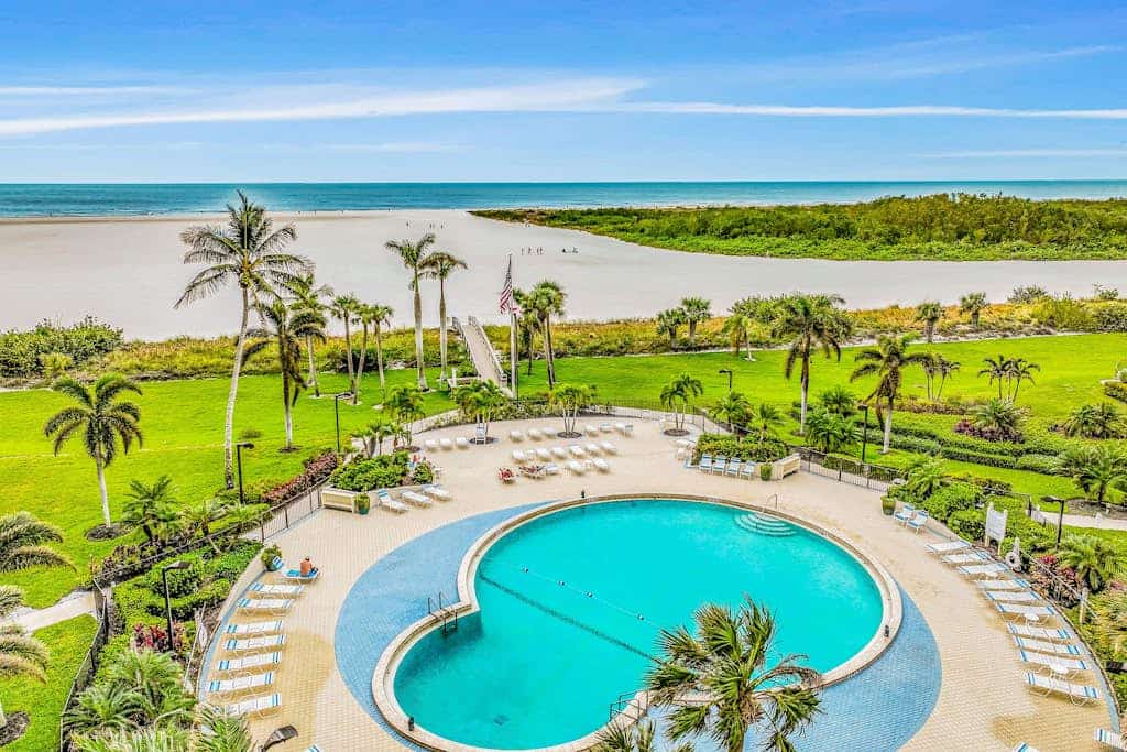 Gulf front condo with heated pool, tennis court, and fitness center
